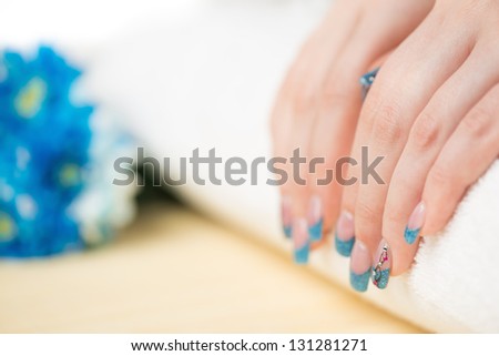 Manicure - Beauty treatment photo of nice manicured woman fingernails. Studio shot.