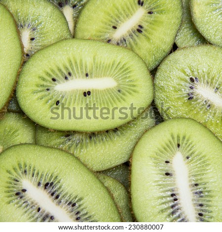 Healthy fruity food, background. Slice of fresh kiwi
