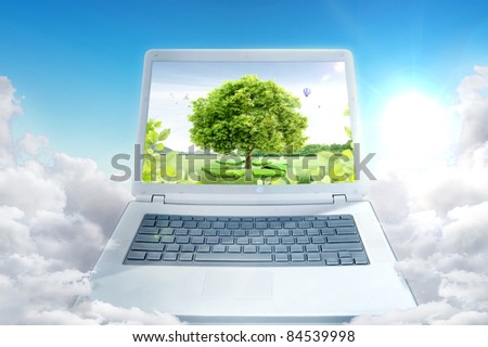 Notebook and landscape. ecological concept
