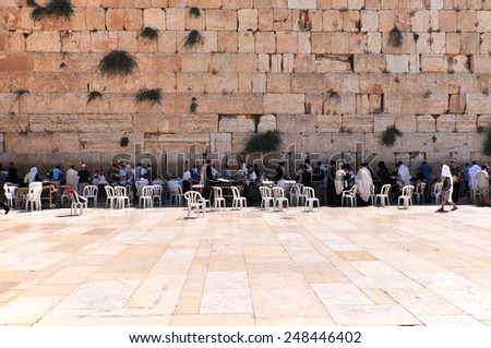 JERUSALEM, ISRAEL - CIRCA AUGUST 2014: The Western Wall and Dome of the Rockin Jerusalem circa Aug 2014. Western Wall, Wailing Wall is the most sacred site recognized by the Jewish faith