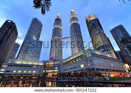KUALA LUMPUR, MALAYSIA - CIRCA JULY 2015: Petronas Twin Towers at night circa July 2015 in Kuala Lumpur. Petronas Twin Towers were the tallest buildings (452 m) in the world from 1998 to 2004.