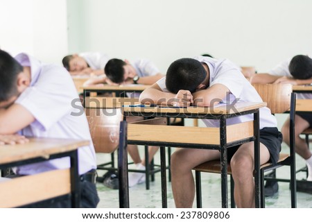 Students sleep in exam room
