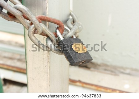 Key lock locked with a chain