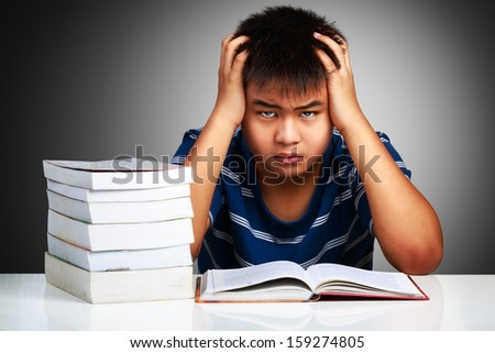 Angry asian boy with learning difficulties Angry asian boy with learning difficulties