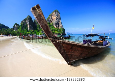 Tropical beach traditional long tail boat andaman sea thailand