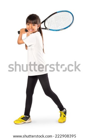 Little asian girl holding tennis racket Isolated over white Little asian girl holding tennis racket Isolated over white