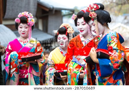 KYOTO, JAPAN - NOVEMBER 20: Maiko in Kyoto, Japan on November 20, 2014. Apprentice geisha in western Japan, especially Kyoto. Their jobs consist of performing songs, dances, and playing the shamisen