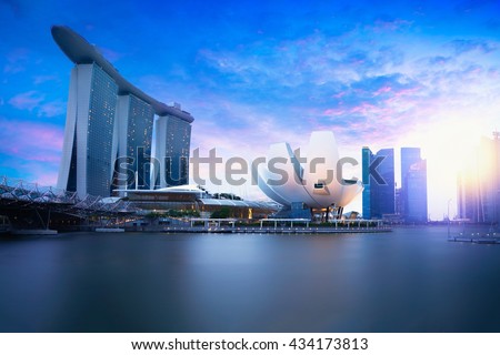 Marina bay Singapore at dusk, Singapore city skyline. Officially the Republic of Singapore