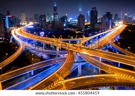Shanghai elevated road junction and interchange overpass at night, Shanghai China