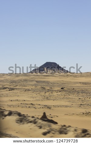 Black desert, Oasis area, Egypt. Black rock was created by the volcanic activity long time ago