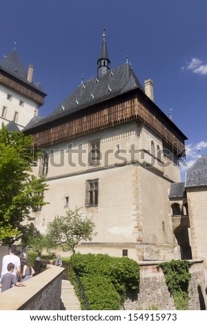PRAGUE - AUGUST 3: People visiting the KarlÃ?Â¡tejn Castle, a large Gothic castle founded that is one of the most famous and most frequently visited castles in the Czech Republic on august 4th, 2013.
