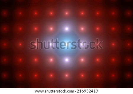 Detailed shining red abstract background in high resolution with a detailed ornamental pattern of blurred dots and circles in rows and columns and with the glowing center in pink and blue