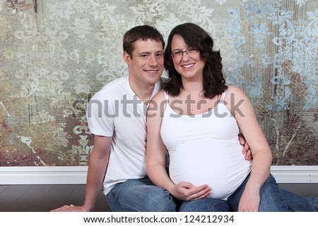 Couple in studio - 8 month Pregnancy photos