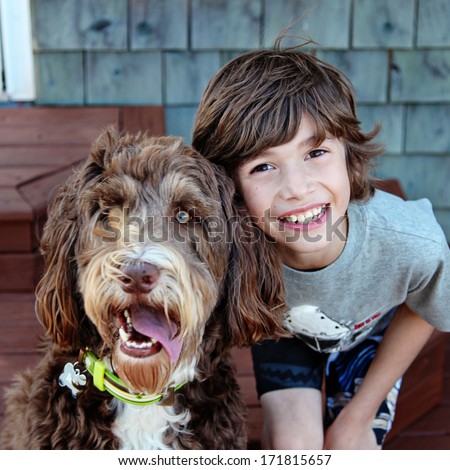 Young boy with Pet Dog closeup