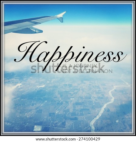 View out airplane window instagram effect with quote - Happiness is a journey not a destination