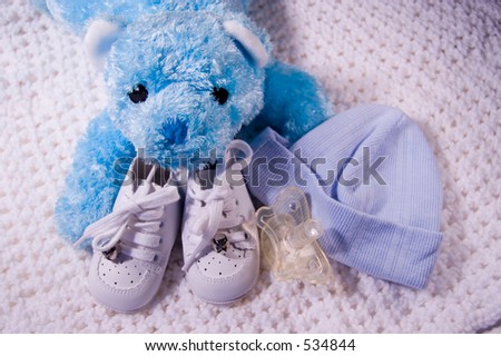 Pair of Babies shoes with Teddy Bear, cap, and Dummy