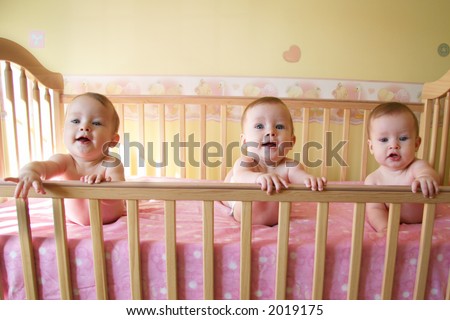 stock photo : Three Little Baby Girls in Crib stock photo : Three Little Baby Girls in Crib