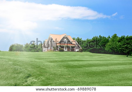 Luxury home with landscaped front yard in Summer