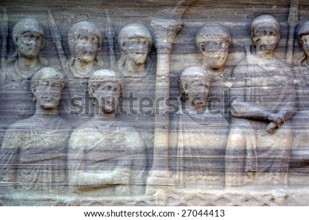 Marble peopl's heads on the base of Egypt obelisk