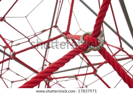 Red rope structure on white background