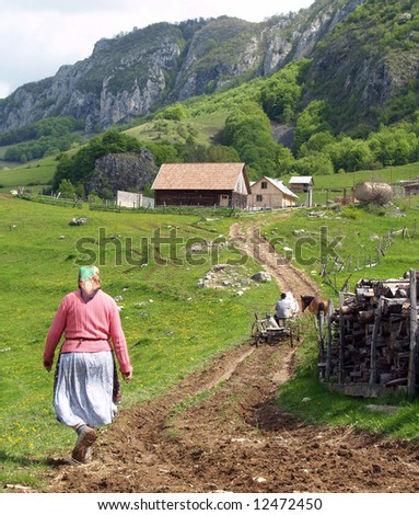 mountain people landscape, old woman and man with carriage