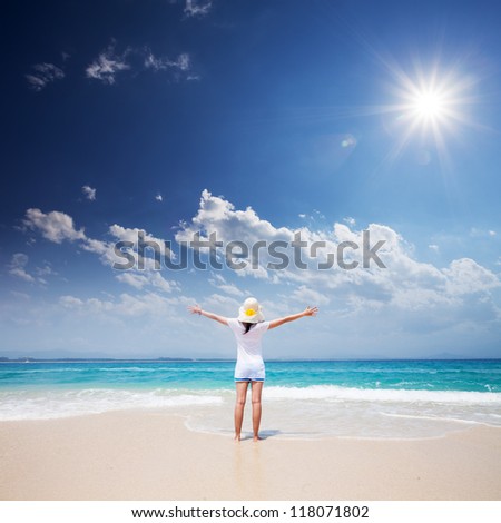 girl standing on beach
