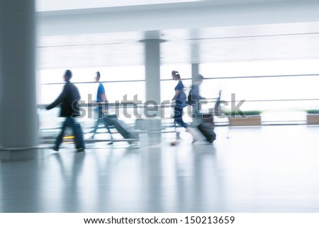 Motion blurred commuters At the Subway Station