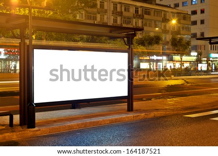 billboard in the station at night