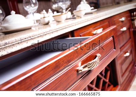 Wooden Cupboard With Opened Empty Drawer