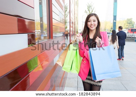 Beauty Woman with Shopping Bags