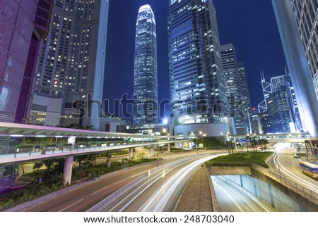 traffic light trails at modern city street,hongkong.