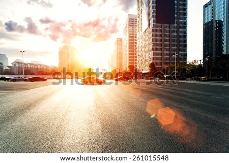 skyline,urban road and office buildings at sunset