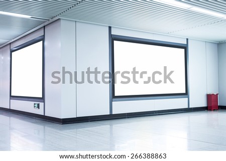 Blank billboard on the wall in airport  corridor
