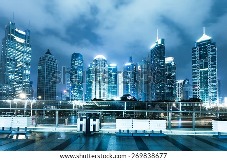 modern street,illuminated skyline and skyscrapers in modern city,shanghai.