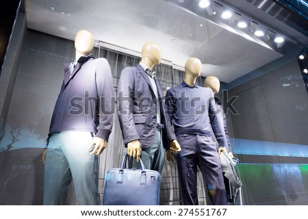 fashion store mannequins in window