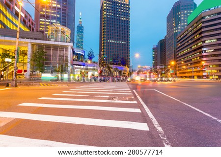 traffic light trails in modern street