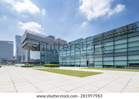 Chengdu,China-July 23,2014:Empty road at modern building exterior in Chengdu.It\'s epitome of fast development in southwest china.