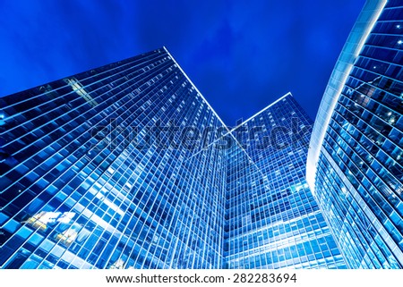 low angle view of illuminated modern building exterior