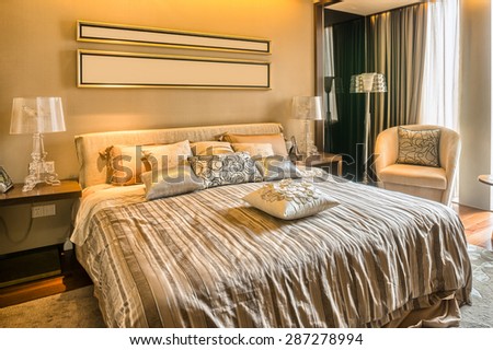 luxury hotel bedroom with upscale furniture and modern style decoration