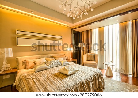 luxury hotel bedroom with upscale furniture and modern style decoration