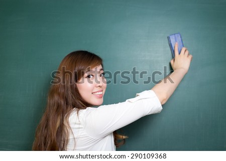 asian beautiful woman clean blackboard