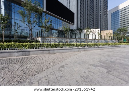 Tianjin,China-May 22,2015:urban building with cement floor road in tianjin.