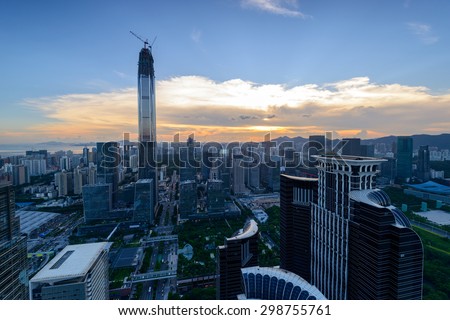 Panoramic skyline and urban cityscape at sunset