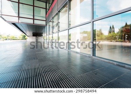 modern building glass wall and empty path