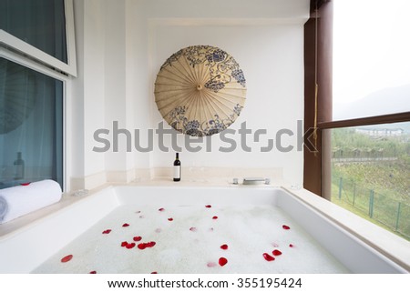 elegant bathtub in modern bathroom of hot spring hotel