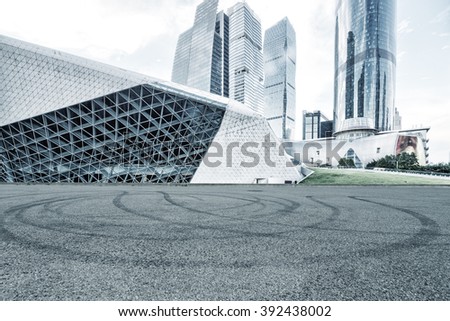 empty asphalt road and modern buildings in guangzhou