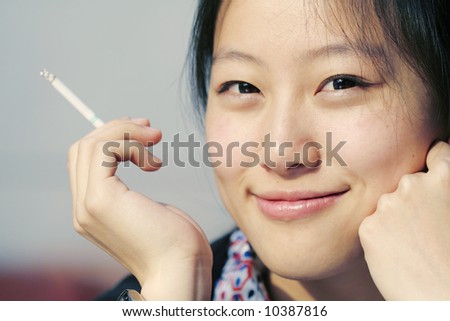 Smoking woman. Concept woman portrait.