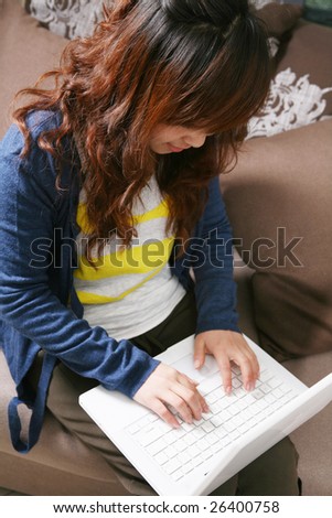 asia girl working on laptop