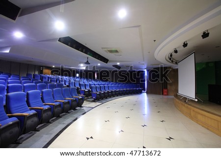 row of chair in theater interior