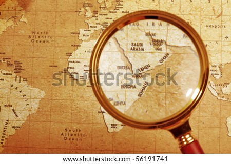 An Magnifier on a Treasure map background